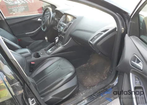 2014 Ford Focus Titanium z USA, uszkodzony, nr VIN 1FADP3J22EL263701